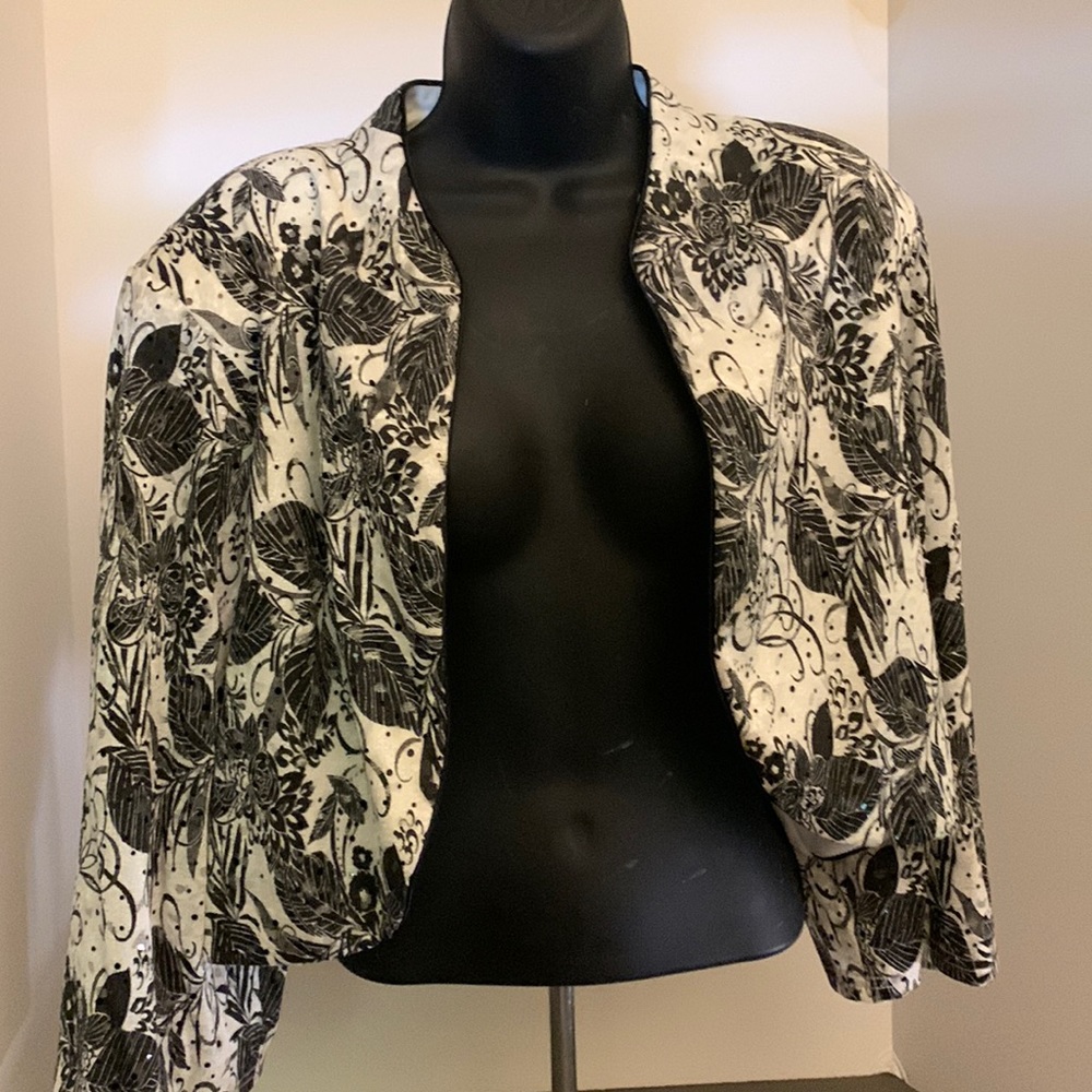 R & M Richards Women’s short dress jacket. It’s black and white. Size 22W.